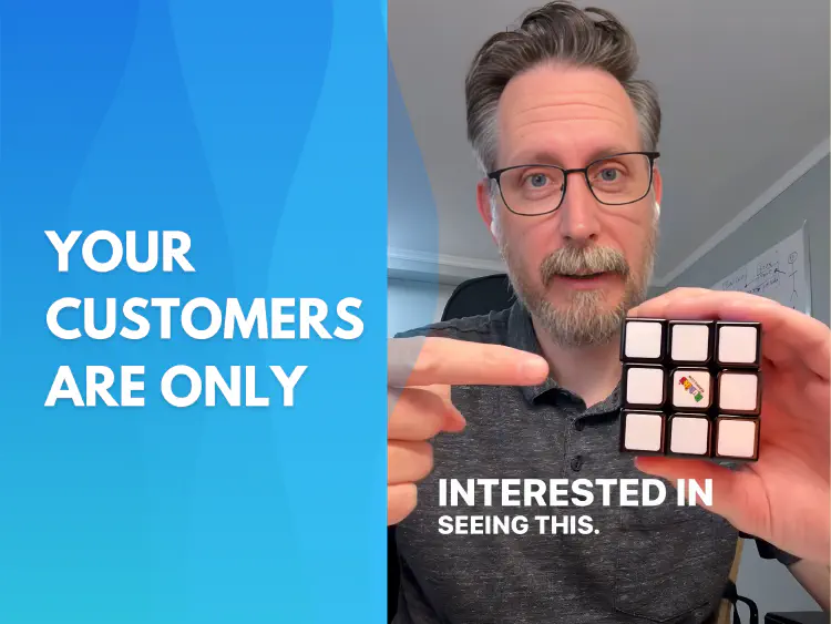 Image of Jay McBride holding a rubiks cube with one side (white) completed to the camera. Title reads "Your customers are only interested in this."